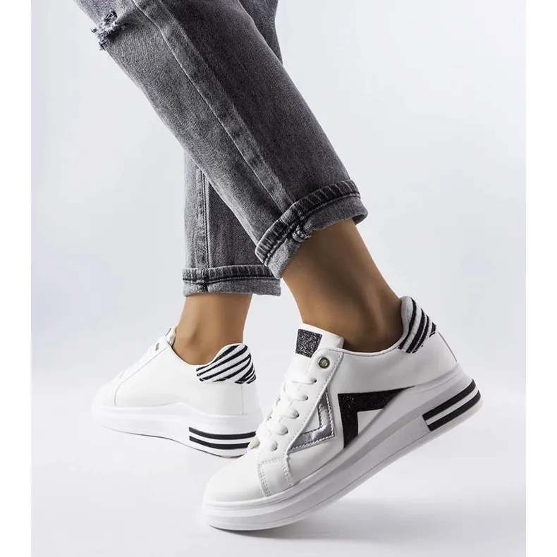 Black and white platform sneakers from Monty