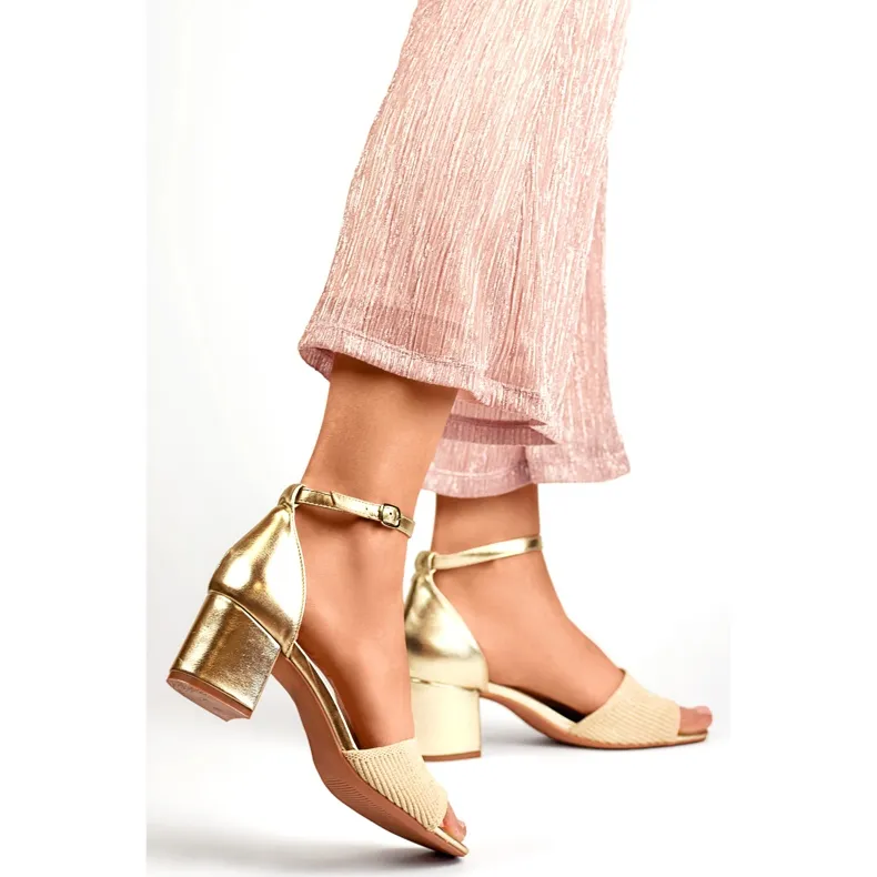 Gold women's low-heeled sandals with ankle fastening beige