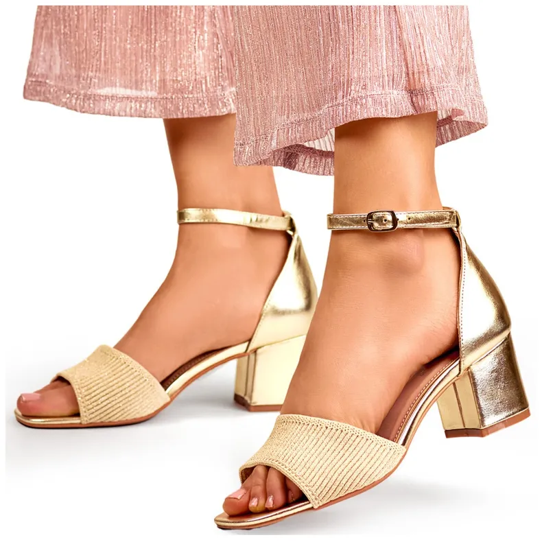 Gold women's low-heeled sandals with ankle fastening beige